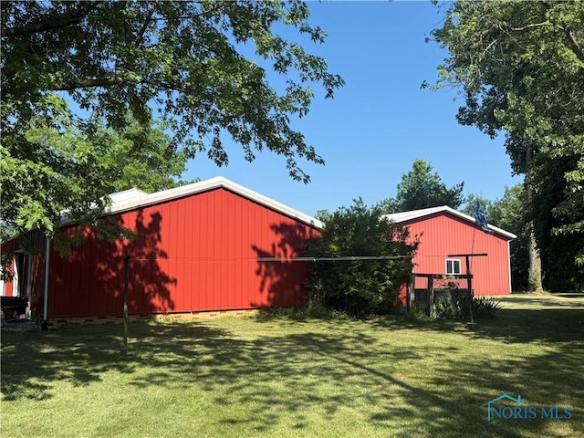 19445 Powers Rd, Defiance, OH 43512 - view of grassy yard featuring an outbuilding and an outdoor structure