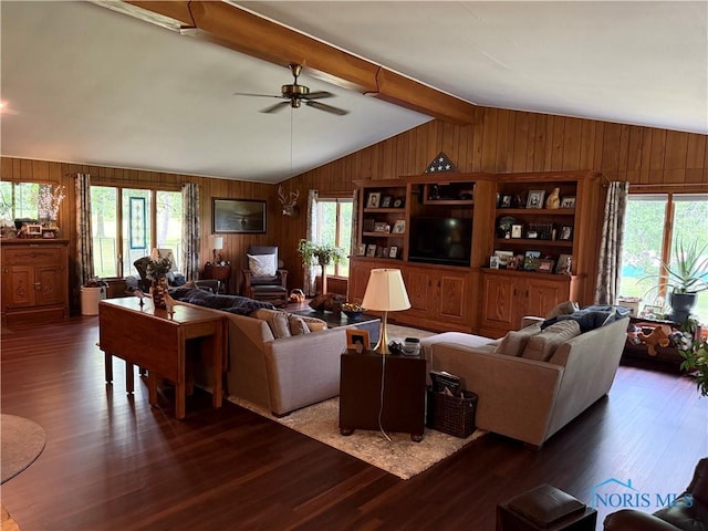 19445 Powers Rd, Defiance, OH 43512 - living room featuring wooden walls, a ceiling fan, and wood finished floors