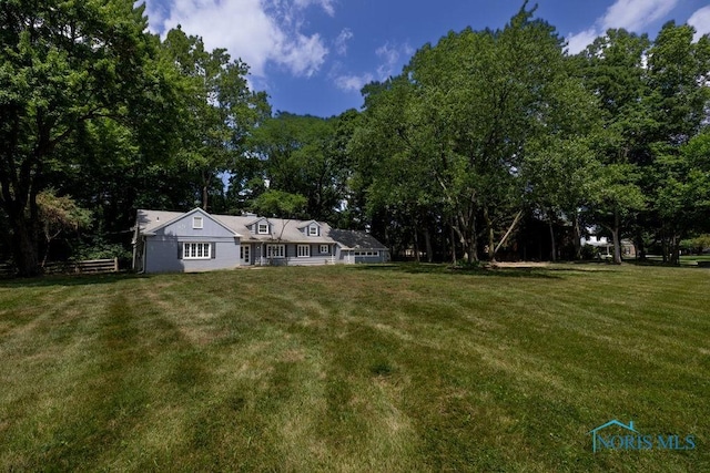4906 Pine Ridge Rd, Toledo, OH 43615 - view of green lawn with view of scattered trees