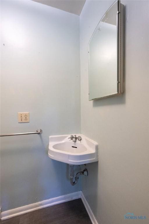 4906 Pine Ridge Rd, Toledo, OH 43615 - bathroom with a sink and baseboards