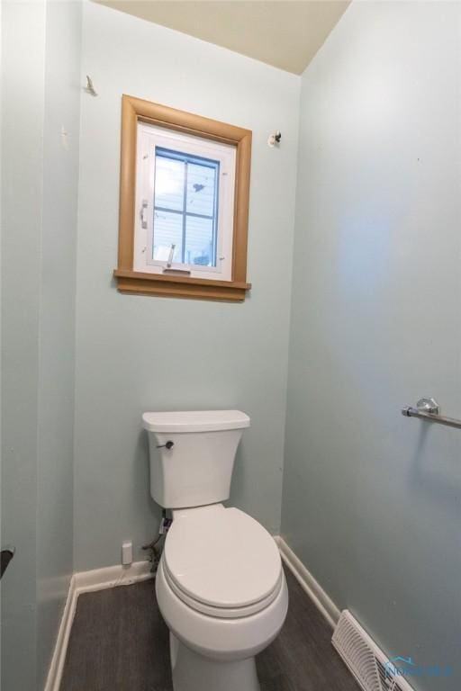 4906 Pine Ridge Rd, Toledo, OH 43615 - bathroom featuring toilet and wood finished floors