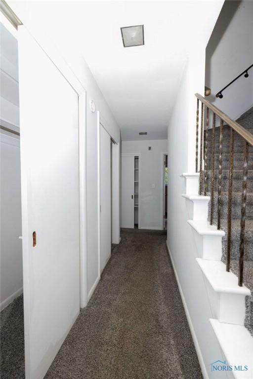 4906 Pine Ridge Rd, Toledo, OH 43615 - corridor featuring carpet and stairway