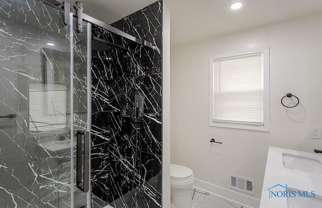 4308 Willis Blvd, Toledo, OH 43623 - bathroom featuring a marble finish shower, marble finish flooring, vanity, and recessed lighting