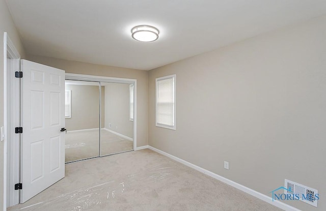 4308 Willis Blvd, Toledo, OH 43623 - unfurnished bedroom featuring a closet and carpet floors