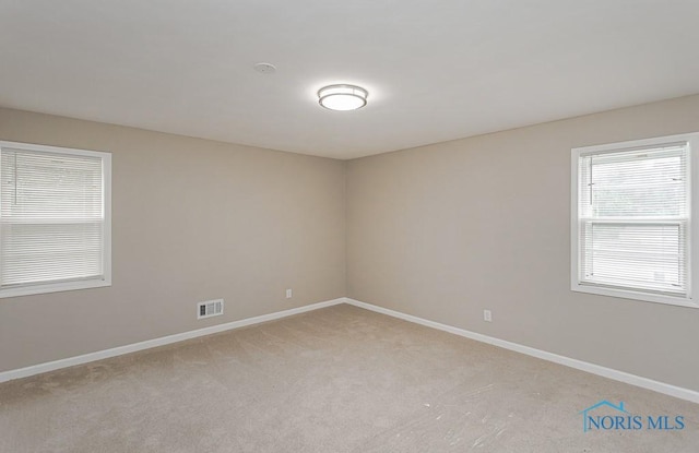 4308 Willis Blvd, Toledo, OH 43623 - empty room featuring baseboards and light carpet