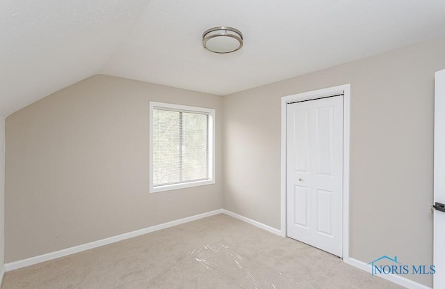 4308 Willis Blvd, Toledo, OH 43623 - additional living space with light colored carpet and lofted ceiling