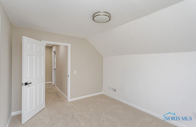 4308 Willis Blvd, Toledo, OH 43623 - bonus room featuring lofted ceiling and light carpet