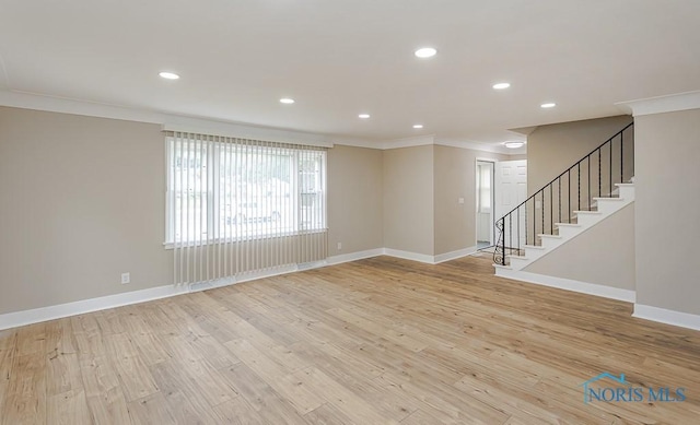 4308 Willis Blvd, Toledo, OH 43623 - unfurnished room with ornamental molding, light wood-type flooring, recessed lighting, and stairway