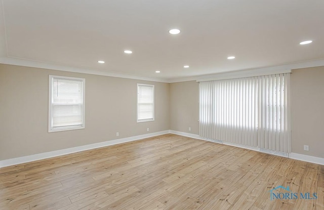 4308 Willis Blvd, Toledo, OH 43623 - unfurnished room with ornamental molding, light wood-style flooring, and recessed lighting