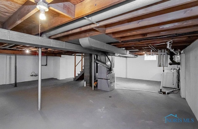 4308 Willis Blvd, Toledo, OH 43623 - basement featuring heating unit and stairs