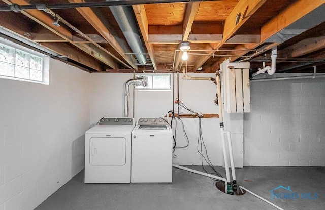 4308 Willis Blvd, Toledo, OH 43623 - laundry room featuring washer and clothes dryer and plenty of natural light