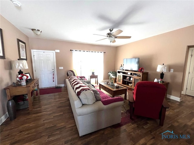 410 Spring St, Upper Sandusky, OH 43351 - living room featuring dark wood finished floors and a ceiling fan