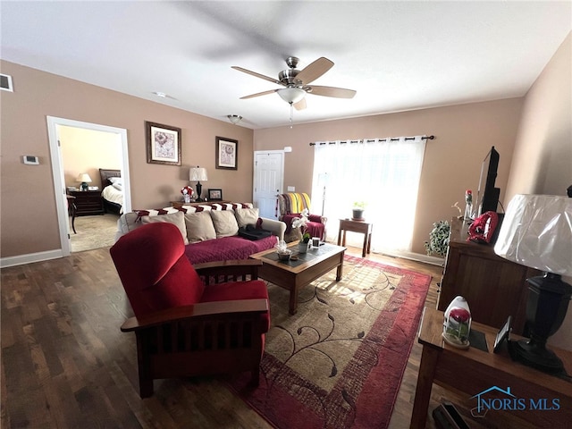 410 Spring St, Upper Sandusky, OH 43351 - living room with wood finished floors and a ceiling fan