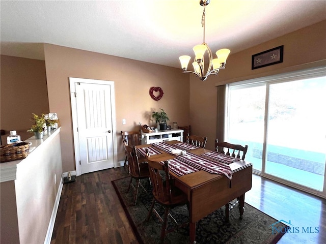 410 Spring St, Upper Sandusky, OH 43351 - dining space featuring a chandelier and dark wood-type flooring