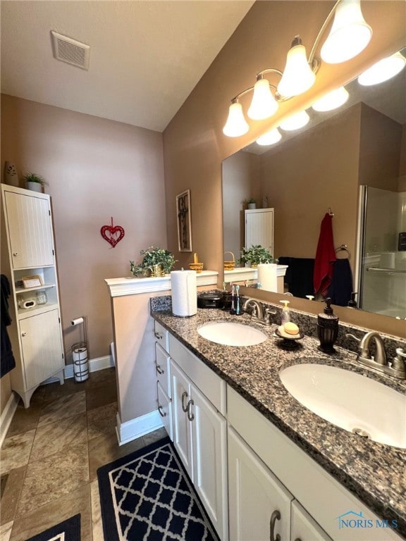 410 Spring St, Upper Sandusky, OH 43351 - full bathroom with double vanity and a shower stall