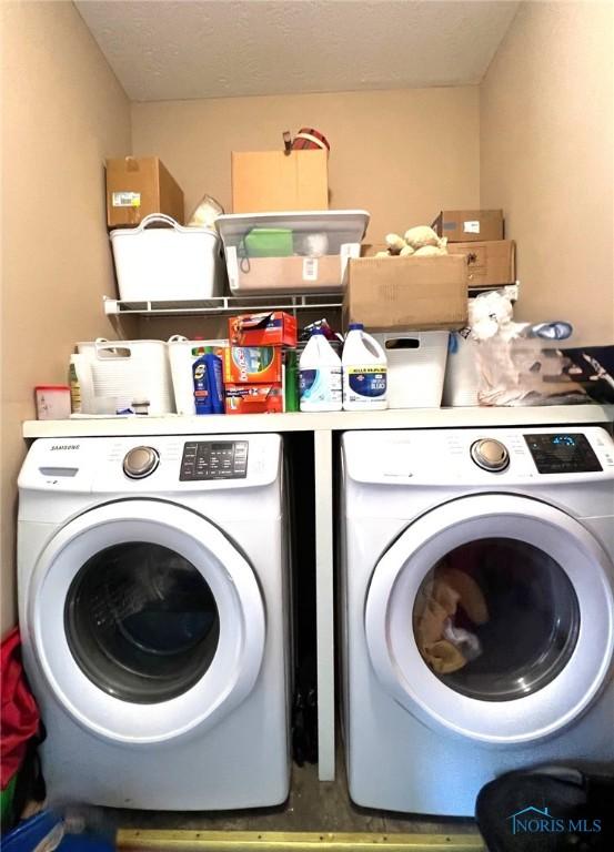 410 Spring St, Upper Sandusky, OH 43351 - laundry room featuring separate washer and dryer