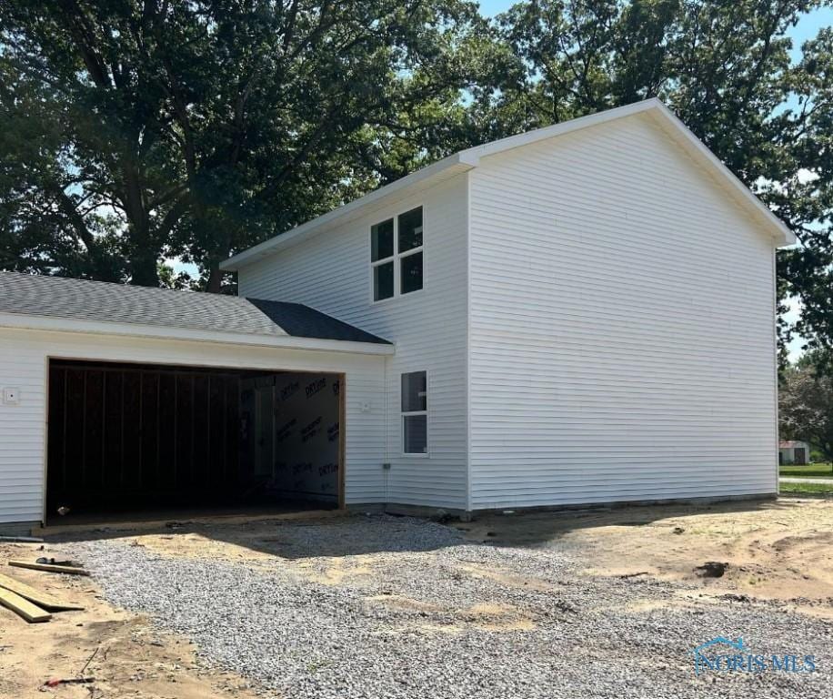 3514 Moffat Rd, Toledo, OH 43615 - view of side of home with a garage