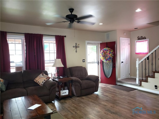 254 Fremont St, Elmore, OH 43416 - living area featuring ceiling fan, stairs, plenty of natural light, wood finished floors, and recessed lighting