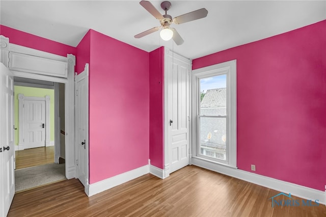 2008 N Main St, Findlay, OH 45840 - empty room featuring wood finished floors and ceiling fan