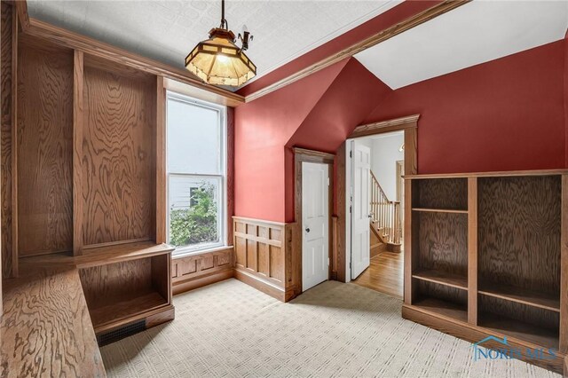 2008 N Main St, Findlay, OH 45840 - mudroom with carpet flooring and crown molding