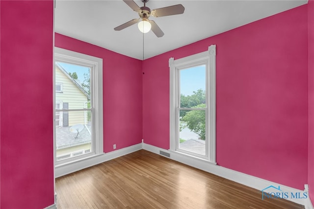 2008 N Main St, Findlay, OH 45840 - spare room featuring wood finished floors and ceiling fan
