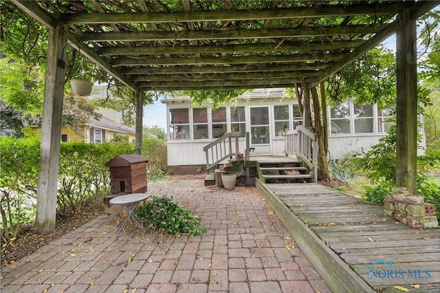 2008 N Main St, Findlay, OH 45840 - view of patio / terrace with a sunroom and a pergola