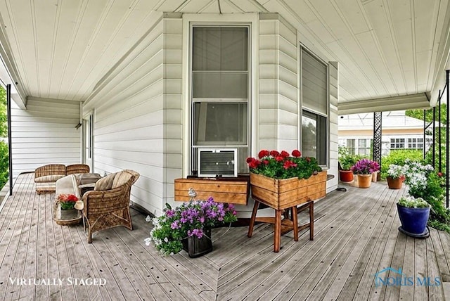 2008 N Main St, Findlay, OH 45840 - porch with an outdoor hangout area and cooling unit