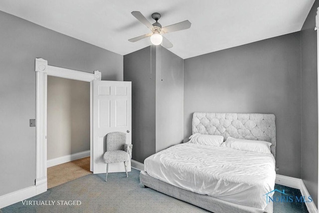 2008 N Main St, Findlay, OH 45840 - carpeted bedroom featuring baseboards and ceiling fan