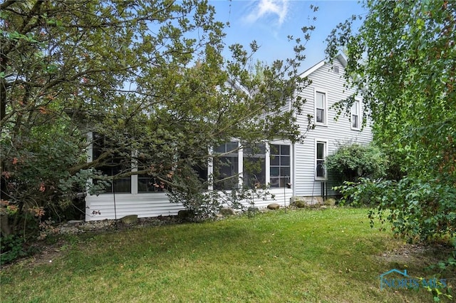 5660 Rd 180, Antwerp, OH 45813 - view of green lawn featuring a sunroom