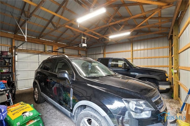 5660 Rd 180, Antwerp, OH 45813 - garage featuring metal wall and a garage door opener