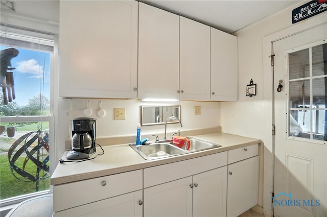 5660 Rd 180, Antwerp, OH 45813 - kitchen featuring white cabinets and light countertops