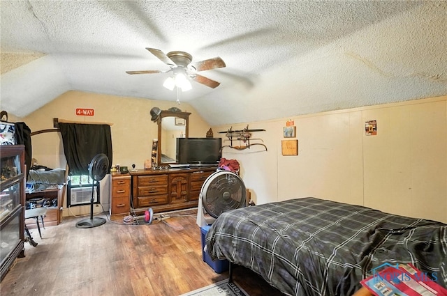 5660 Rd 180, Antwerp, OH 45813 - bedroom featuring wood finished floors, vaulted ceiling, a textured ceiling, and a ceiling fan