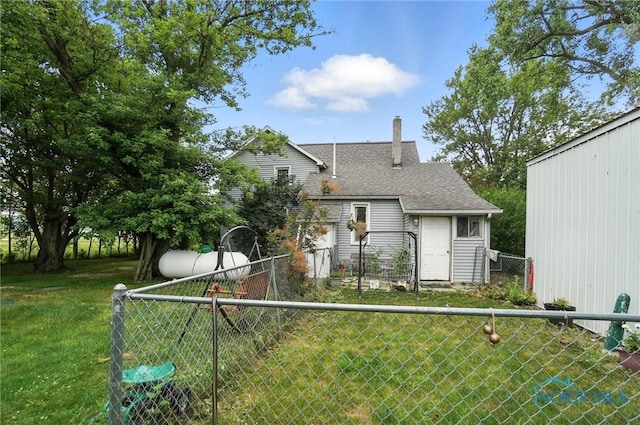 5660 Rd 180, Antwerp, OH 45813 - back of house with a chimney and a shingled roof
