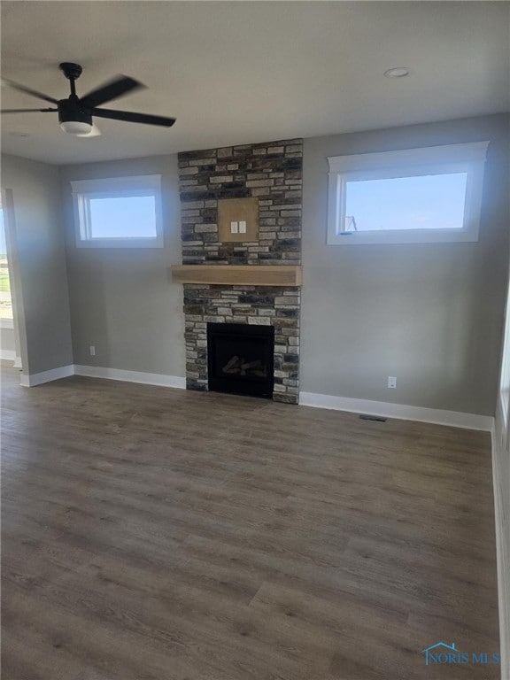 6332 Pimlico Rd, Whitehouse, OH 43571 - unfurnished living room with a fireplace, wood finished floors, and a ceiling fan