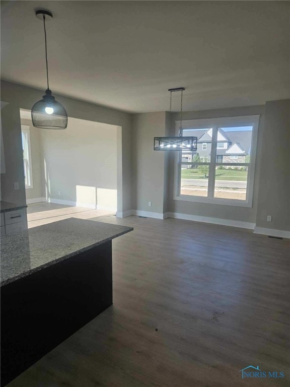 6332 Pimlico Rd, Whitehouse, OH 43571 - unfurnished dining area featuring wood finished floors and healthy amount of natural light