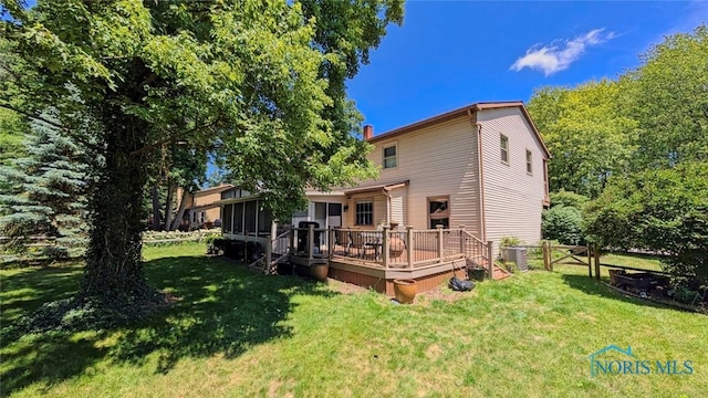 2359 Cheshire Woods Rd, Toledo, OH 43617 - back of house with a wooden deck