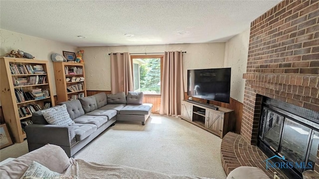 2359 Cheshire Woods Rd, Toledo, OH 43617 - carpeted living area featuring a textured ceiling and a fireplace