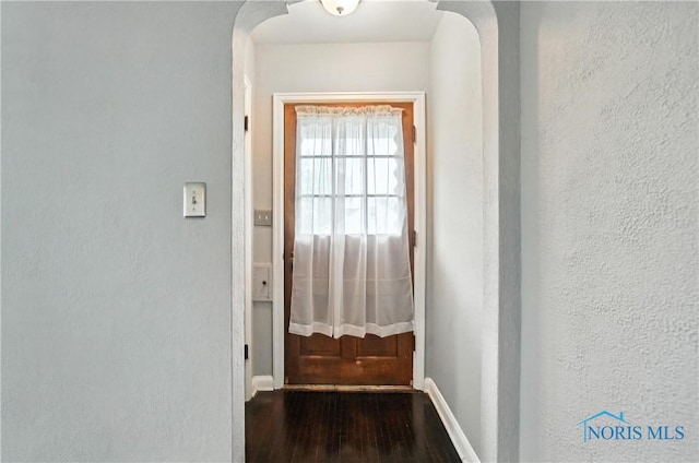 1447 Craigwood Rd, Toledo, OH 43612 - corridor with dark wood-type flooring and a textured wall