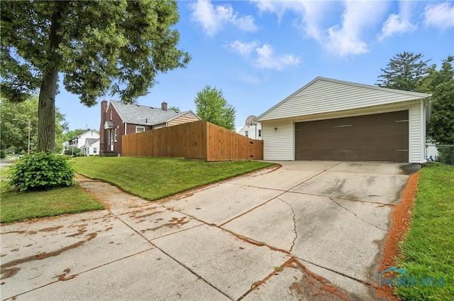 1447 Craigwood Rd, Toledo, OH 43612 - view of side of property featuring a garage