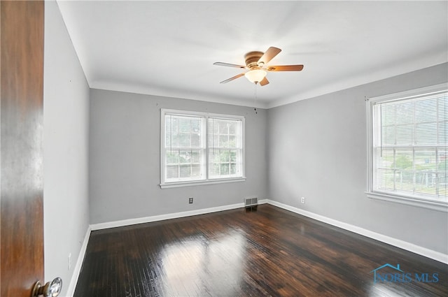 1447 Craigwood Rd, Toledo, OH 43612 - spare room with a ceiling fan and dark wood finished floors