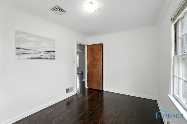 1447 Craigwood Rd, Toledo, OH 43612 - unfurnished room featuring hardwood / wood-style floors and baseboards