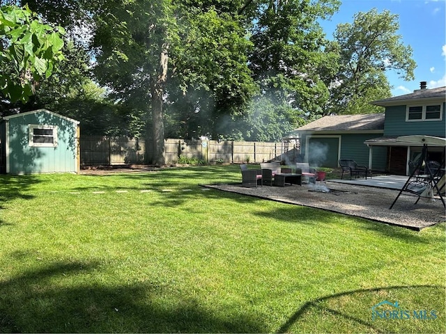2920 Copland Blvd, Toledo, OH 43614 - fenced backyard with a patio and a shed