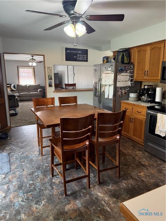 1819 Queenswood Dr, Findlay, OH 45840 - dining space featuring a ceiling fan