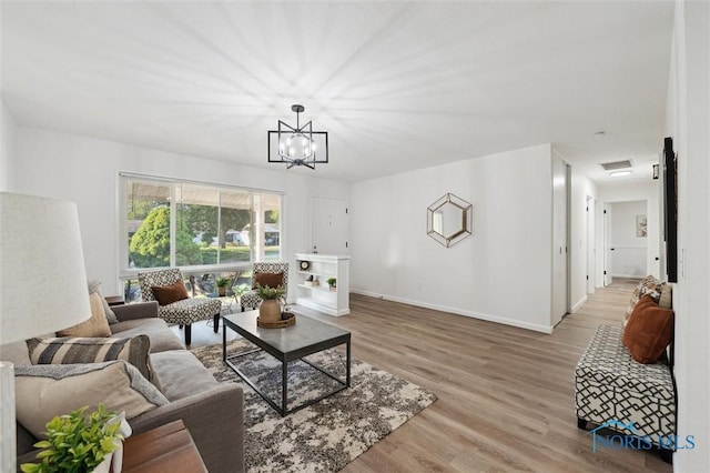 3129 Elmview Dr, Toledo, OH 43613 - living room with wood finished floors and a chandelier