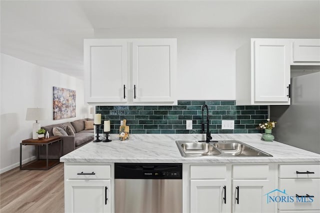 3129 Elmview Dr, Toledo, OH 43613 - kitchen featuring dishwasher, white cabinets, tasteful backsplash, and light wood-style floors