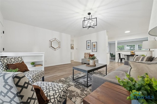 3129 Elmview Dr, Toledo, OH 43613 - living area featuring a chandelier, light wood-style flooring, and recessed lighting