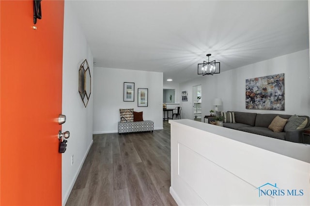 3129 Elmview Dr, Toledo, OH 43613 - entrance foyer featuring wood finished floors and a chandelier