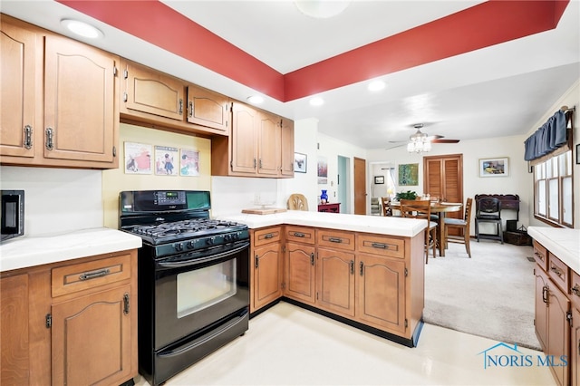 229 Hawthorn Dr, Archbold, OH 43502 - kitchen featuring black range with gas stovetop, recessed lighting, a peninsula, light countertops, and ceiling fan