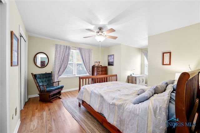 229 Hawthorn Dr, Archbold, OH 43502 - bedroom featuring light wood-style flooring and ceiling fan