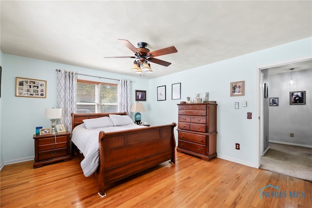 229 Hawthorn Dr, Archbold, OH 43502 - bedroom with light wood finished floors and ceiling fan